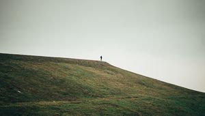 Preview wallpaper man, alone, hill, field, nature