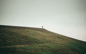 Preview wallpaper man, alone, hill, field, nature