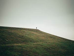 Preview wallpaper man, alone, hill, field, nature