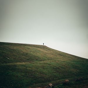 Preview wallpaper man, alone, hill, field, nature