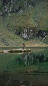 Preview wallpaper man, alone, lake, mountain, reflection