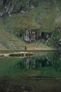 Preview wallpaper man, alone, lake, mountain, reflection