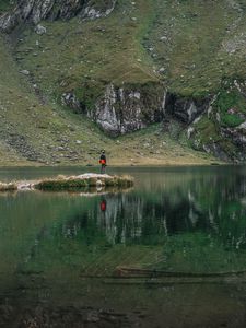 Preview wallpaper man, alone, lake, mountain, reflection
