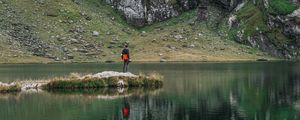 Preview wallpaper man, alone, lake, mountain, reflection