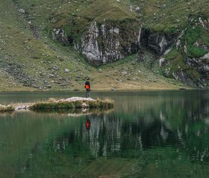 Preview wallpaper man, alone, lake, mountain, reflection