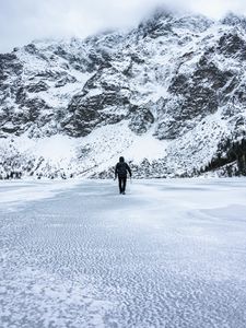 Preview wallpaper man, alone, loneliness, mountains, snow, winter