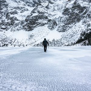 Preview wallpaper man, alone, loneliness, mountains, snow, winter