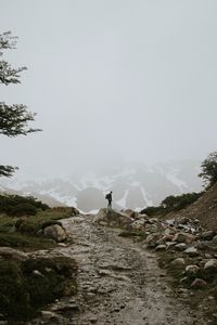 Preview wallpaper man, alone, mountains, road, fog