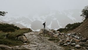 Preview wallpaper man, alone, mountains, road, fog