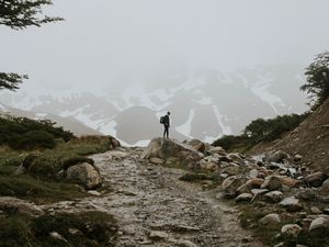 Preview wallpaper man, alone, mountains, road, fog