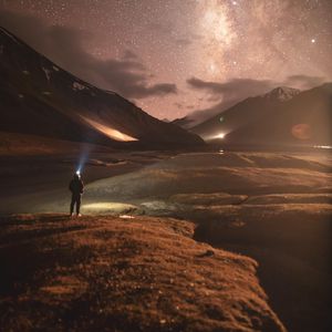 Preview wallpaper man, alone, mountains, stars, night, nature