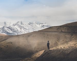 Preview wallpaper man, alone, mountains, snow, view, nature