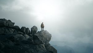 Preview wallpaper man, alone, peak, mountains, fog