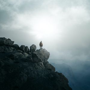 Preview wallpaper man, alone, peak, mountains, fog