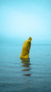 Preview wallpaper man, alone, raincoat, water, rain