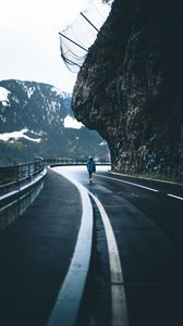 Preview wallpaper man, alone, road, turn, mountains