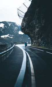 Preview wallpaper man, alone, road, turn, mountains