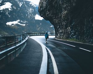 Preview wallpaper man, alone, road, turn, mountains