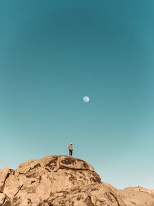 Preview wallpaper man, alone, rock, peak, nature