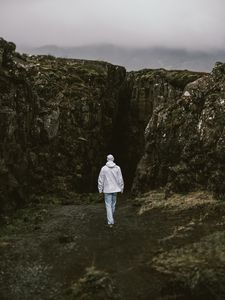 Preview wallpaper man, alone, rock, gorge