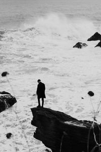 Preview wallpaper man, alone, rock, sea, waves, bw