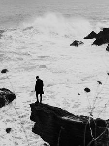 Preview wallpaper man, alone, rock, sea, waves, bw