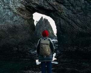 Preview wallpaper man, alone, rocks, arch, nature