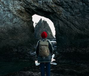 Preview wallpaper man, alone, rocks, arch, nature