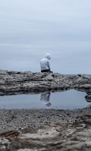 Preview wallpaper man, alone, sad, rock, sea