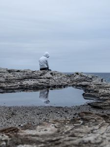 Preview wallpaper man, alone, sad, rock, sea