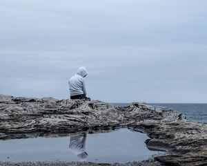 Preview wallpaper man, alone, sad, rock, sea