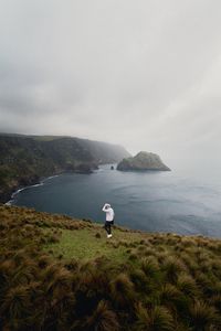 Preview wallpaper man, alone, sea, cliff, landscape, nature