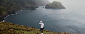 Preview wallpaper man, alone, sea, cliff, landscape, nature