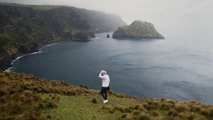 Preview wallpaper man, alone, sea, cliff, landscape, nature