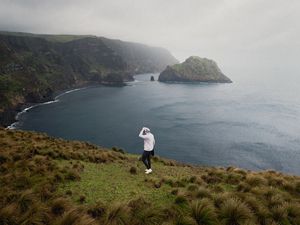 Preview wallpaper man, alone, sea, cliff, landscape, nature