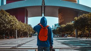 Preview wallpaper man, alone, style, trees, street