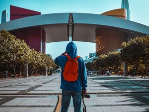 Preview wallpaper man, alone, style, trees, street