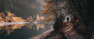 Preview wallpaper man, alone, trees, river, autumn, free