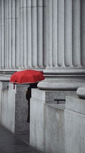 Preview wallpaper man, alone, umbrella, columns, red