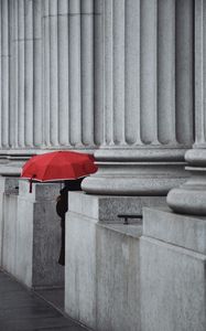 Preview wallpaper man, alone, umbrella, columns, red