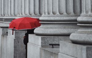 Preview wallpaper man, alone, umbrella, columns, red