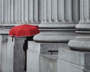 Preview wallpaper man, alone, umbrella, columns, red