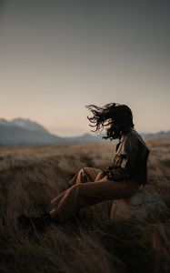 Preview wallpaper man, alone, wind, hair, grass