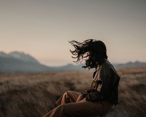 Preview wallpaper man, alone, wind, hair, grass