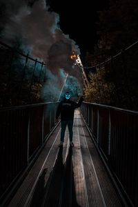 Preview wallpaper man, anonymous, mask, neon, smoke, bridge