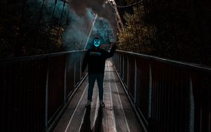 Preview wallpaper man, anonymous, mask, neon, smoke, bridge