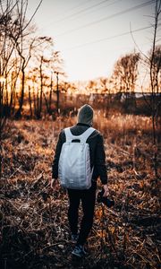 Preview wallpaper man, backpack, hood, camera, photographer