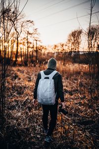 Preview wallpaper man, backpack, hood, camera, photographer