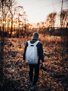 Preview wallpaper man, backpack, hood, camera, photographer