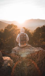 Preview wallpaper man, backpack, hood, nature, alone